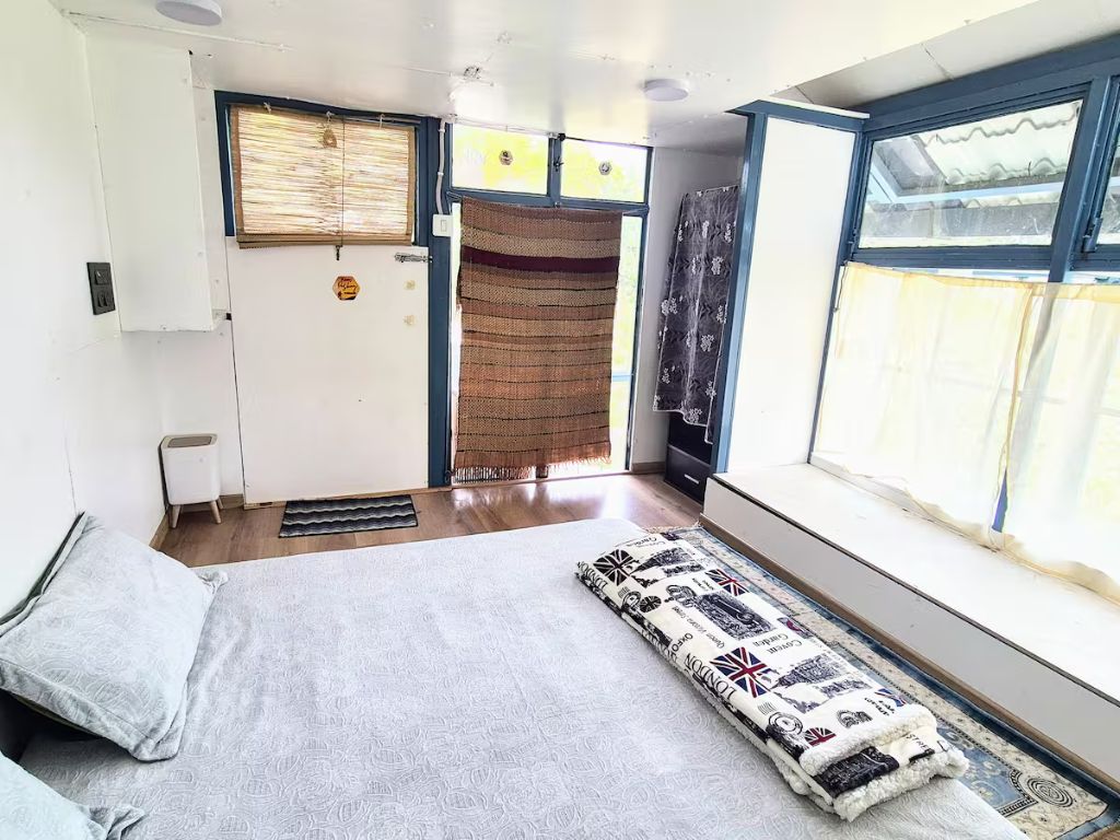Bedroom with rustic door